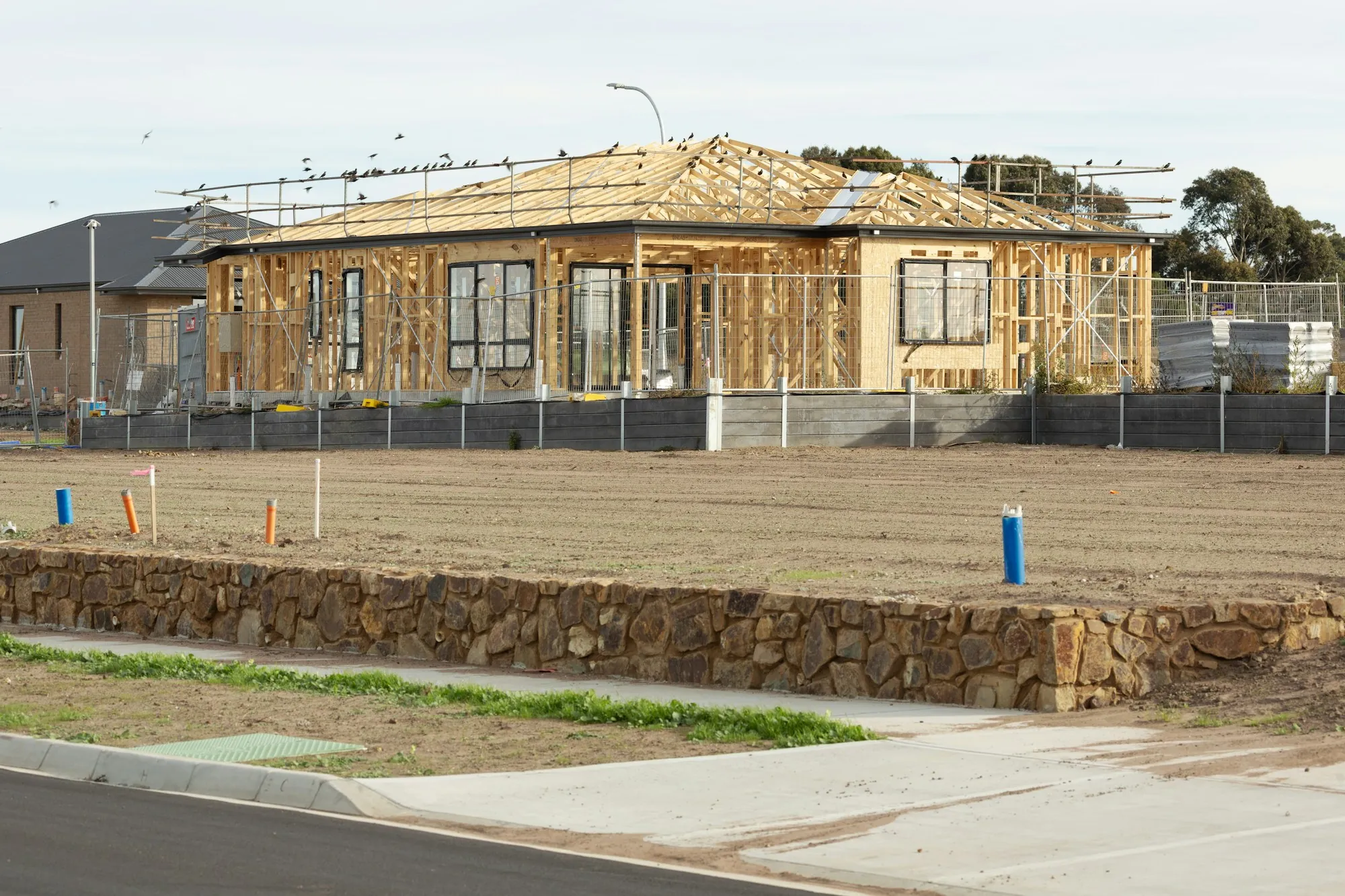 Framed single-story home on a cleared lot
